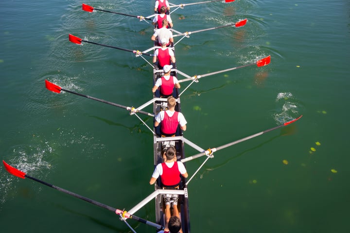 Crew Team in Rowing in a Canoe